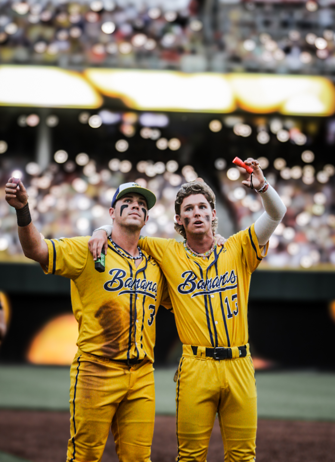 Savannah Bananas baseball players holding lights in a stadium