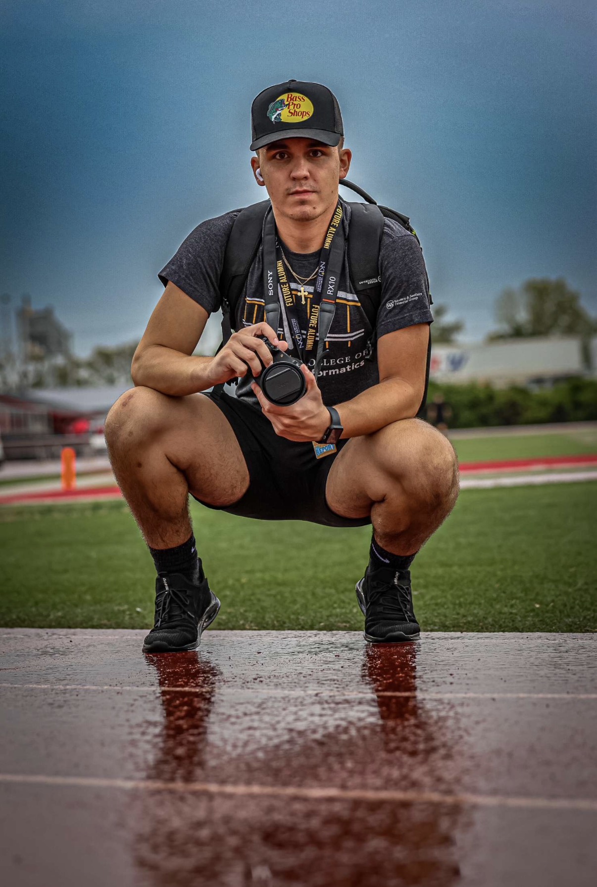 Dimitrije Fisic with a camera on a sports sideline